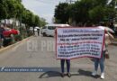 Protestan en la capital padres de familia de una secundaria de Tlacotepec; exigen maestros y pagos