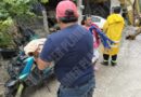 Evacuan a familia por colapso de muro de contención